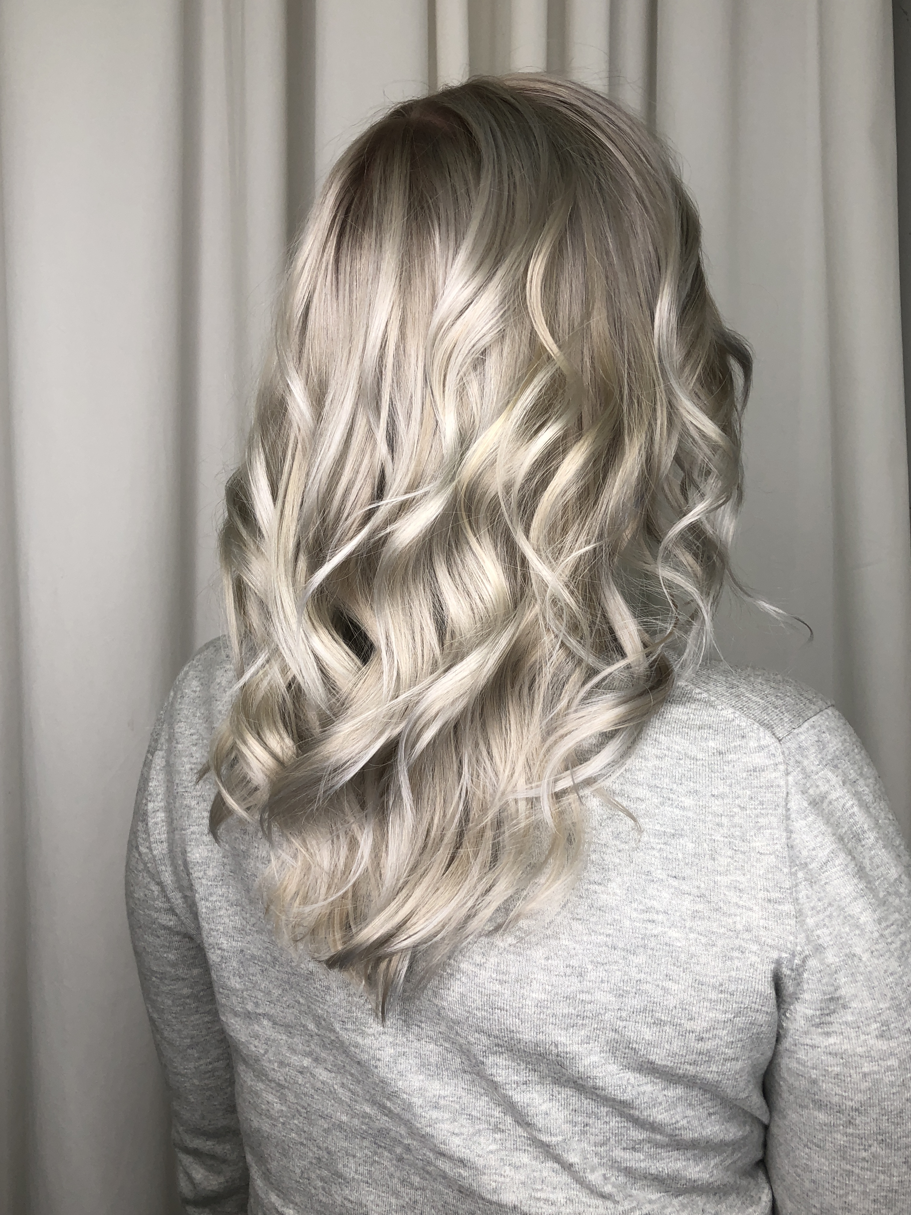 A client with pale, wavy hair