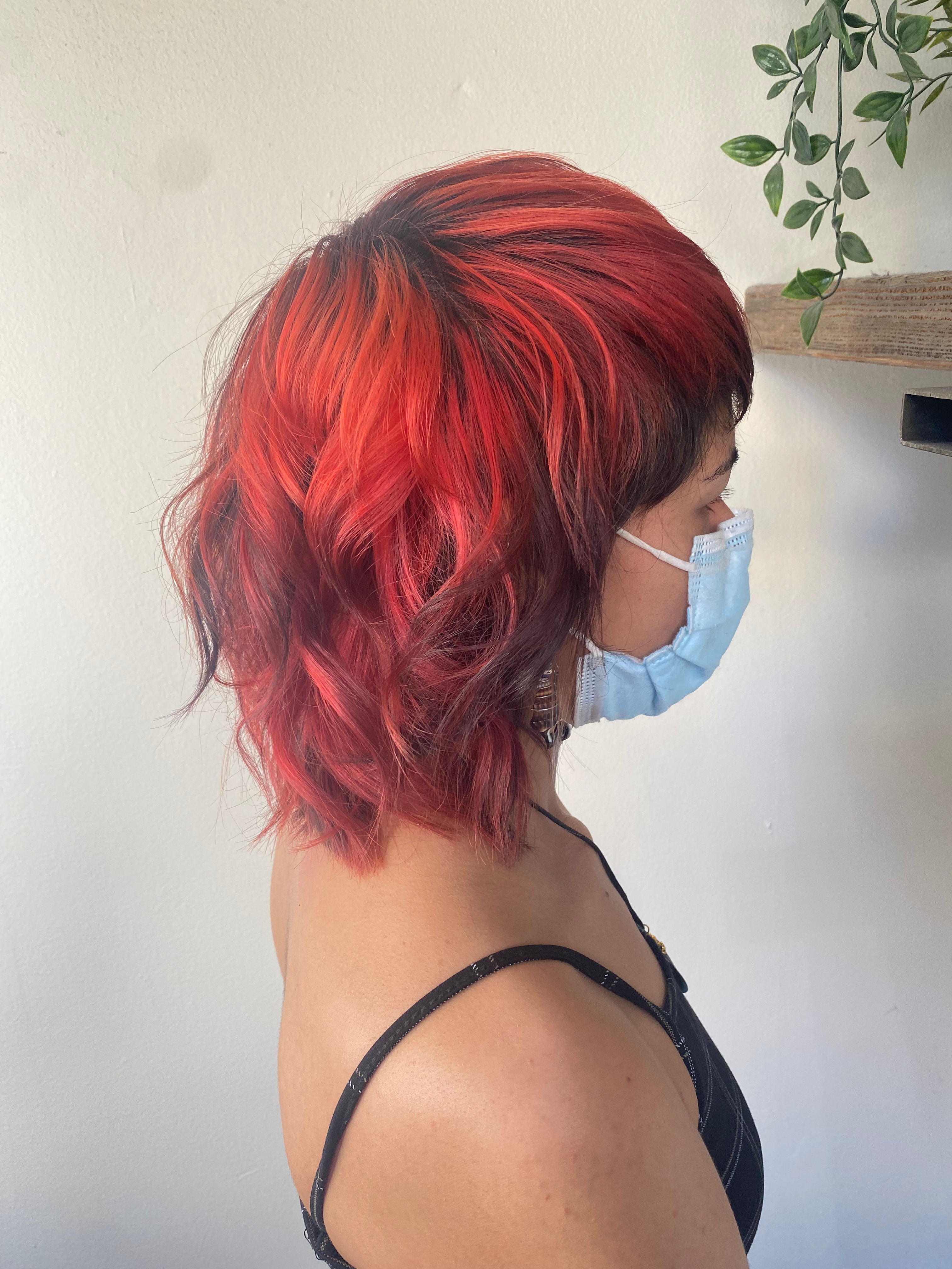 A client with a cute pink haircut
