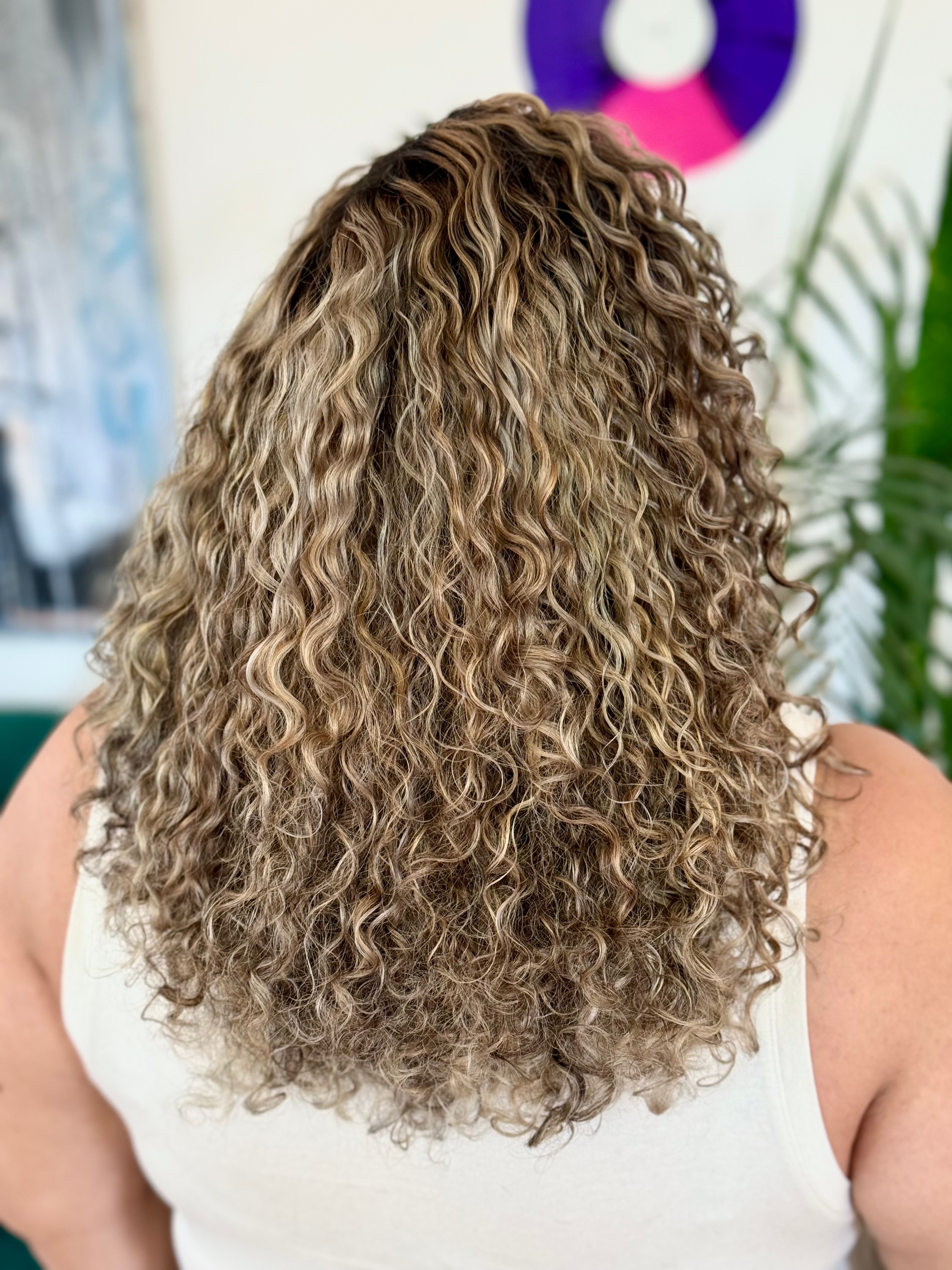 A long, curly hair cut