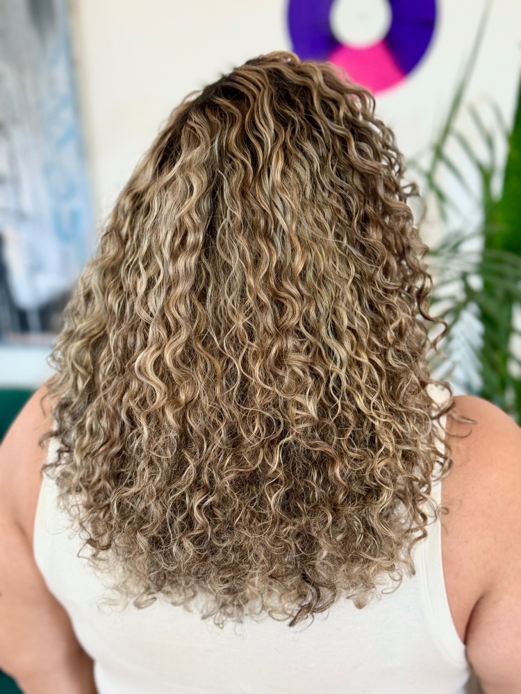 A long, curly hair cut